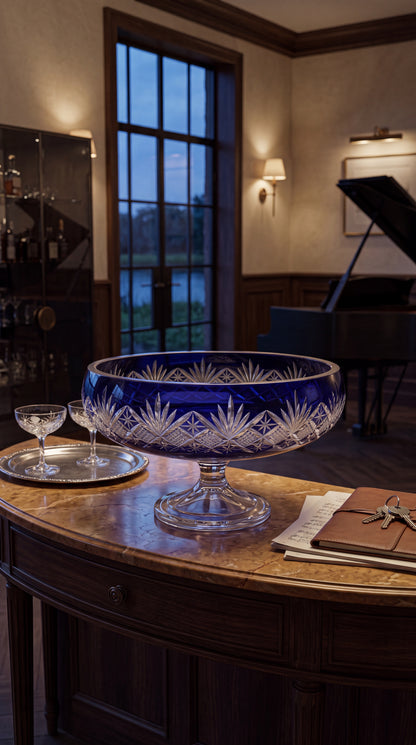 Midnight Sapphire Coronet pedestal bowl on a round desk in a piano room