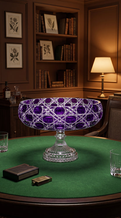 Verdura Regal Violet pedestal bowl displayed on a green baize game table beside books