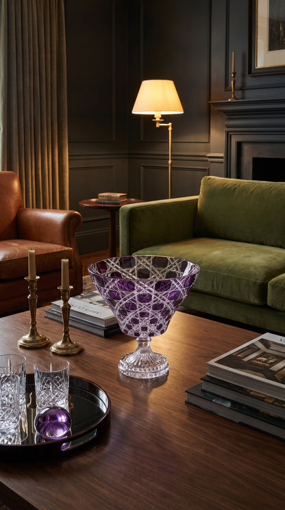 Verdura Regal Violet trumpet bowl on a library coffee table beside books and a tray